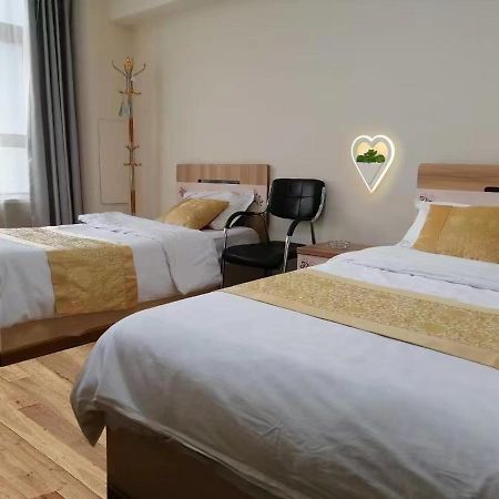Xinming Fashion Hotel หยานจี๋ ภายนอก รูปภาพ