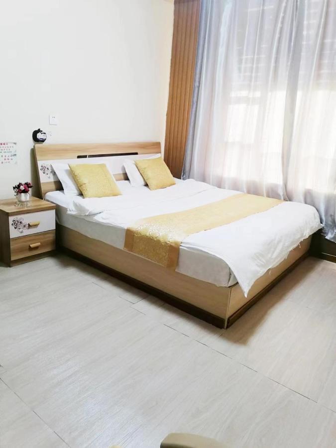 Xinming Fashion Hotel หยานจี๋ ภายนอก รูปภาพ